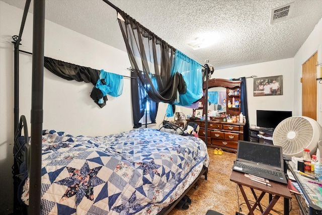 bedroom with a textured ceiling