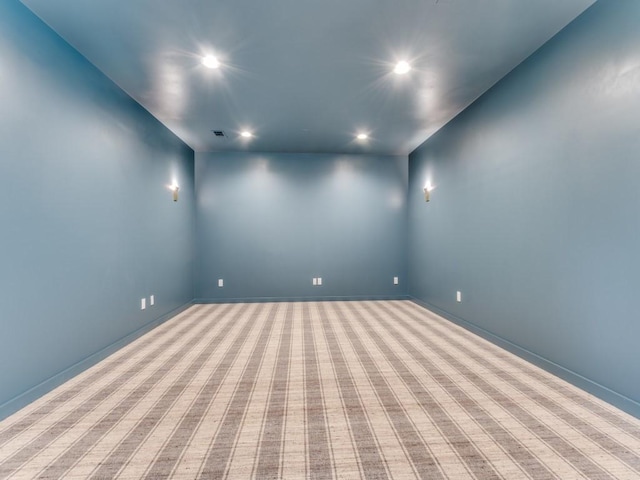 empty room with light colored carpet