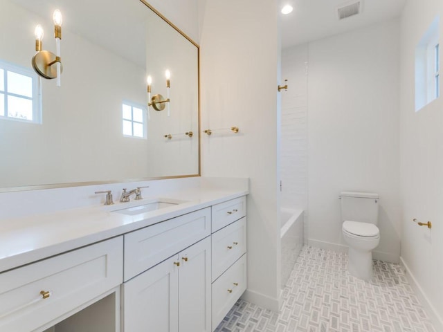 full bathroom featuring a wealth of natural light, vanity, shower / bath combination, and toilet