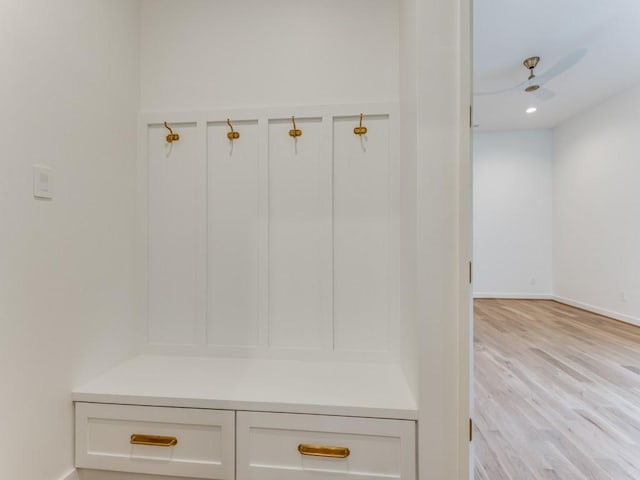 mudroom featuring ceiling fan and light wood-type flooring