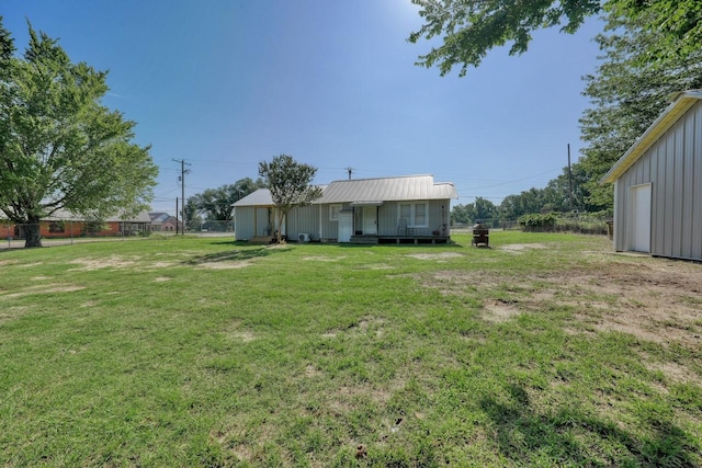 view of yard featuring covered porch