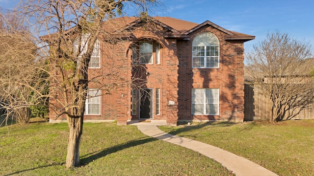 view of front of home featuring a front yard