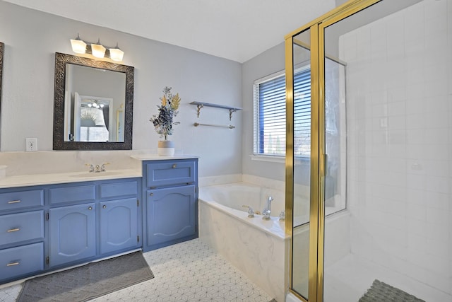 bathroom with tile patterned flooring, shower with separate bathtub, and vanity