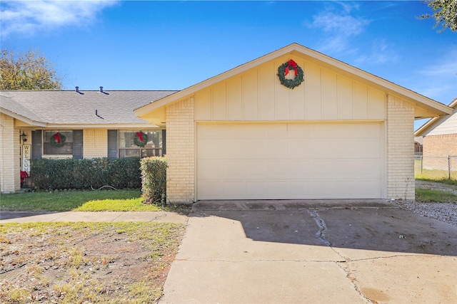 ranch-style home with a garage