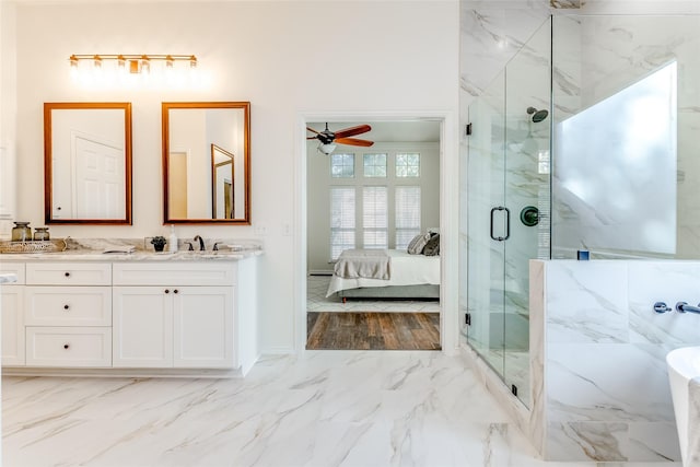 bathroom with vanity, separate shower and tub, and ceiling fan