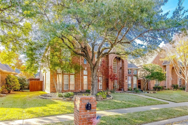 view of front of home with a front lawn