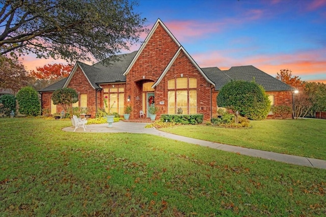 view of front of home with a yard