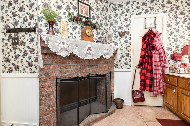 interior details with a brick fireplace