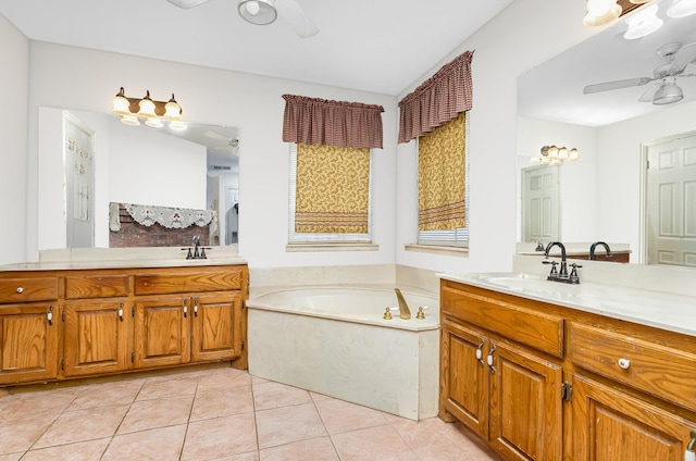 bathroom featuring vanity, ceiling fan, tile patterned flooring, and a bathtub