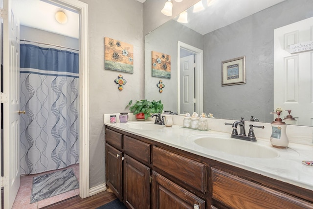 bathroom featuring vanity and walk in shower