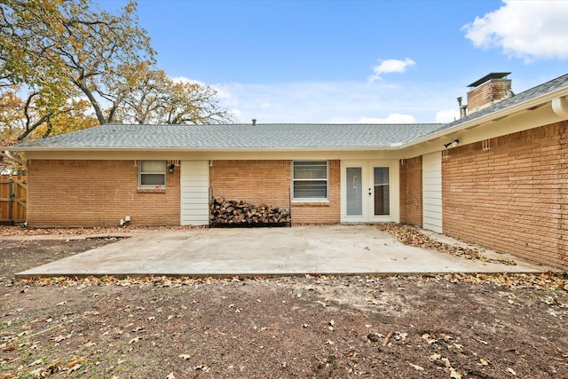 rear view of property featuring a patio