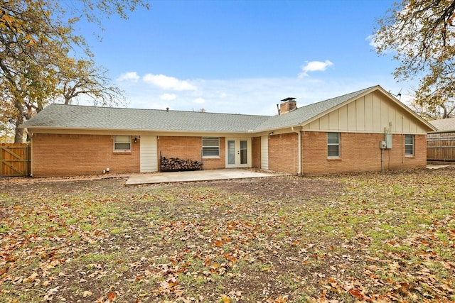 rear view of property with a patio