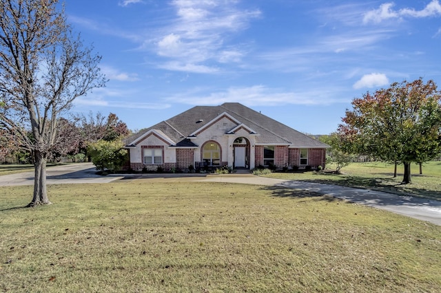 view of front of home with a front yard