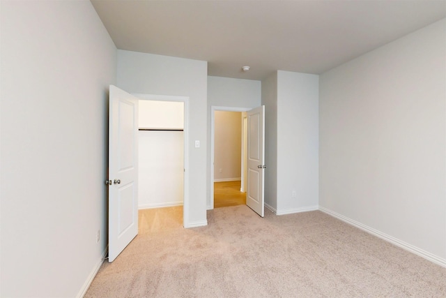 7220 Monarch Trl, Mckinney, TX 75071 - unfurnished bedroom with light colored carpet and baseboards