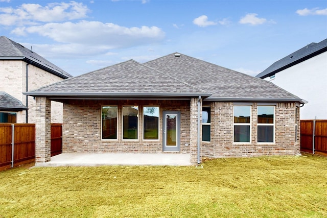 7220 Monarch Trl, Mckinney, TX 75071 - rear view of property with roof with shingles, brick siding, and a patio