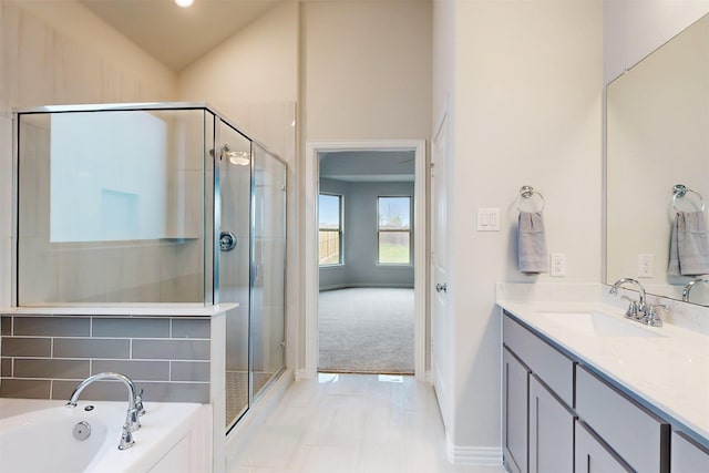 7220 Monarch Trl, Mckinney, TX 75071 - full bath with vanity, a stall shower, a bath, and baseboards