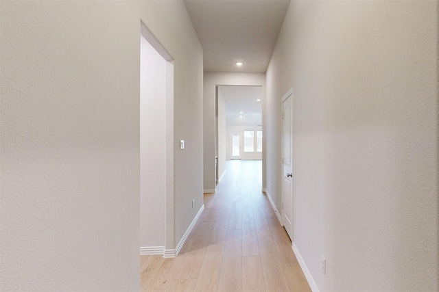7220 Monarch Trl, Mckinney, TX 75071 - corridor featuring light wood-style flooring, recessed lighting, and baseboards