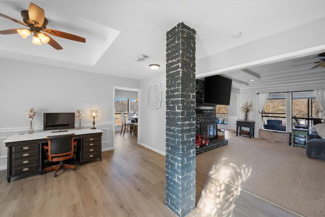 office space featuring light wood-type flooring and ceiling fan