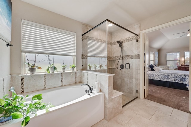 bathroom with tile patterned floors, ceiling fan, independent shower and bath, and lofted ceiling