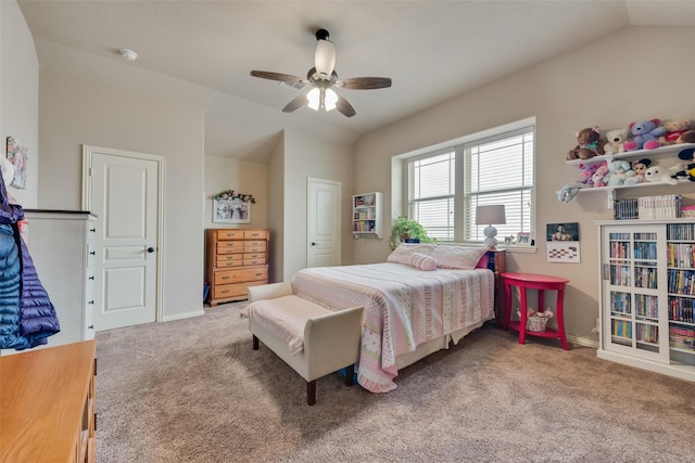 carpeted bedroom with ceiling fan and lofted ceiling