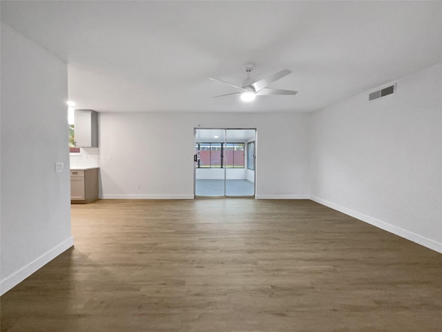 unfurnished room featuring wood-type flooring and ceiling fan