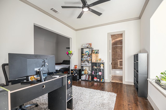 office space with crown molding, ceiling fan, and dark hardwood / wood-style floors