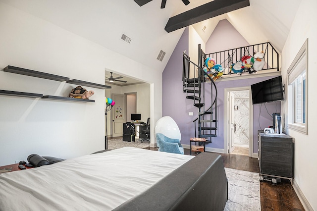 bedroom with ceiling fan, dark hardwood / wood-style flooring, and high vaulted ceiling