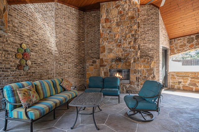 view of patio / terrace featuring an outdoor living space with a fireplace