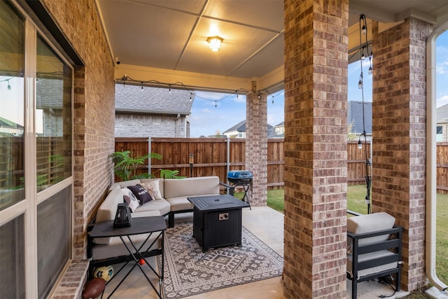 view of patio / terrace with a grill and an outdoor hangout area