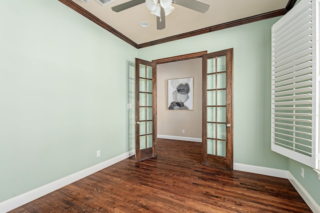 spare room with ceiling fan, ornamental molding, dark wood-type flooring, and french doors