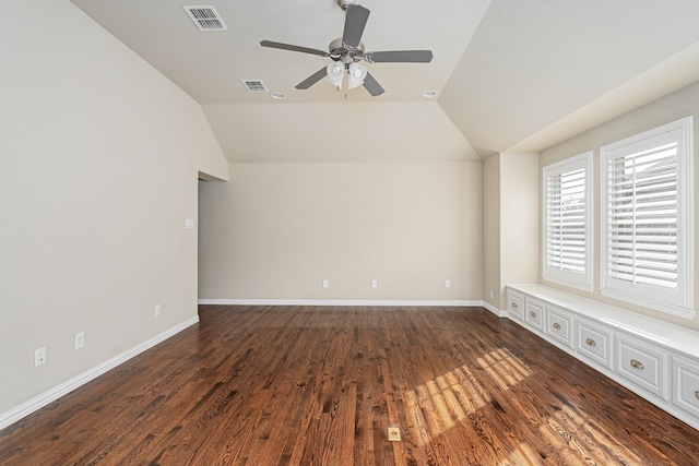 interior space with dark wood-type flooring, ceiling fan, and lofted ceiling