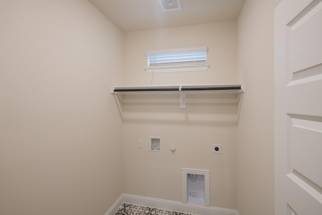 laundry room featuring hookup for an electric dryer, gas dryer hookup, and hookup for a washing machine