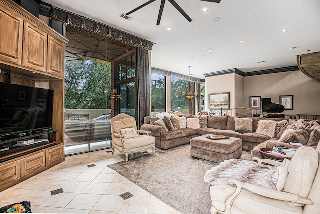 tiled living room featuring ceiling fan and ornamental molding