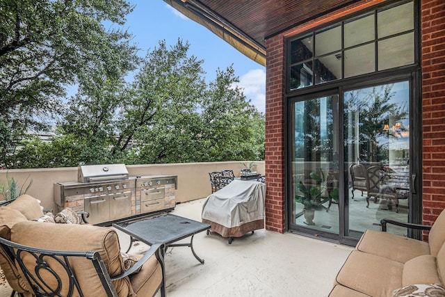 view of patio / terrace with exterior kitchen and area for grilling