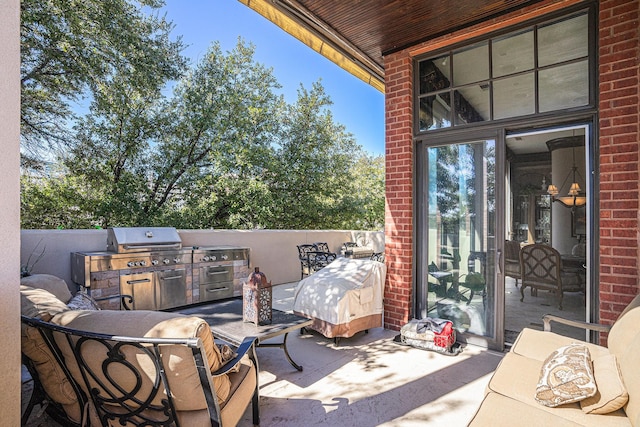 view of patio / terrace featuring an outdoor kitchen