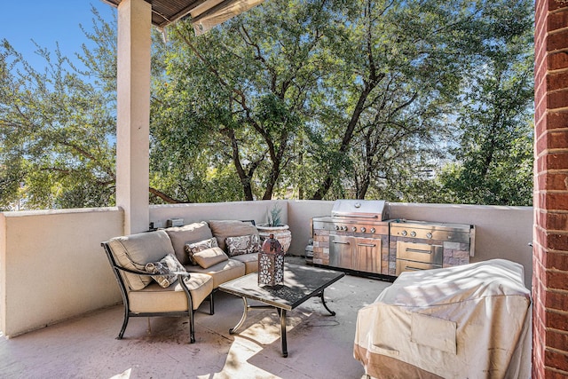 view of patio / terrace with an outdoor kitchen