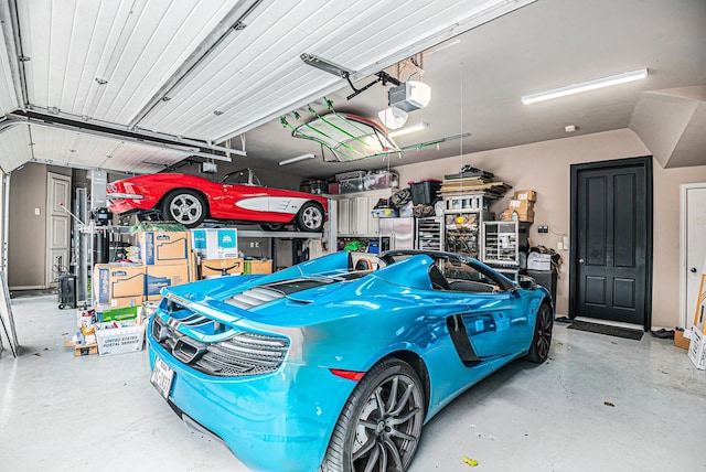 garage featuring a garage door opener