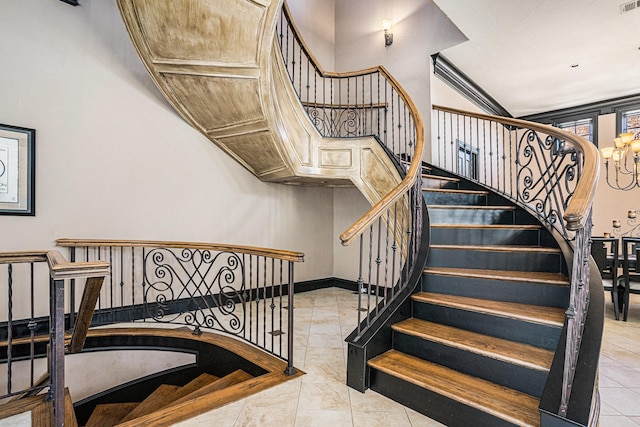 staircase featuring tile patterned flooring