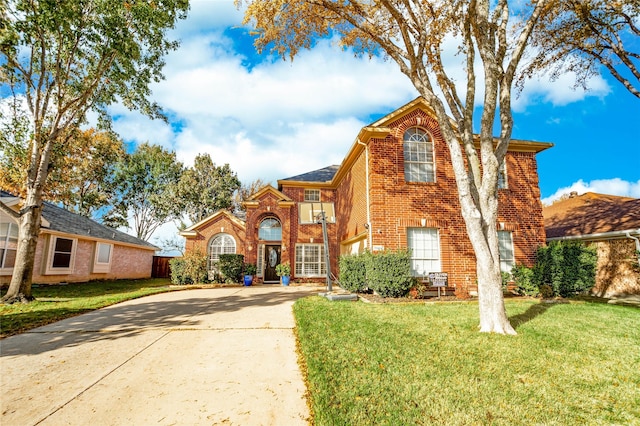 view of front of property with a front lawn