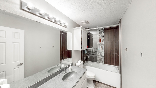 full bathroom featuring shower / bath combo, toilet, a textured ceiling, and vanity