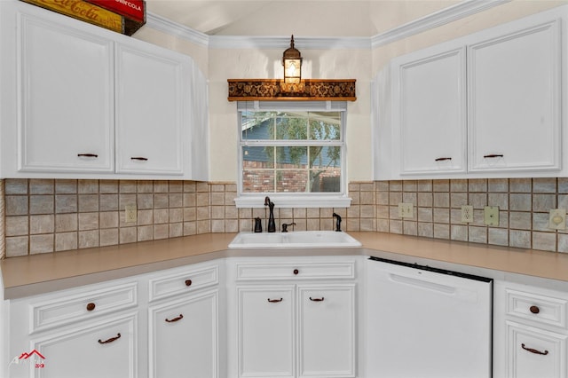 kitchen featuring dishwasher, white cabinetry, sink, and tasteful backsplash