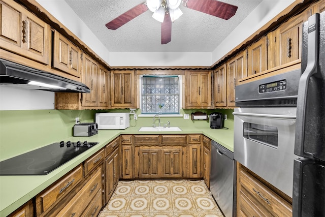 kitchen with a textured ceiling, sink, ceiling fan, and black appliances