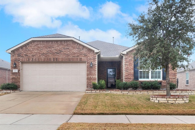 ranch-style home with a garage and a front lawn