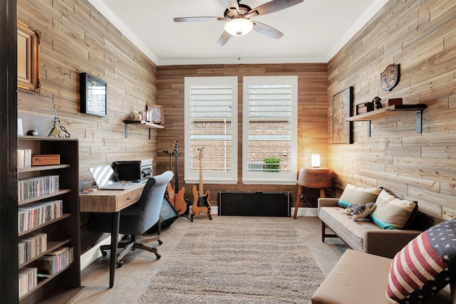 office featuring light tile patterned floors, ornamental molding, ceiling fan, and wood walls