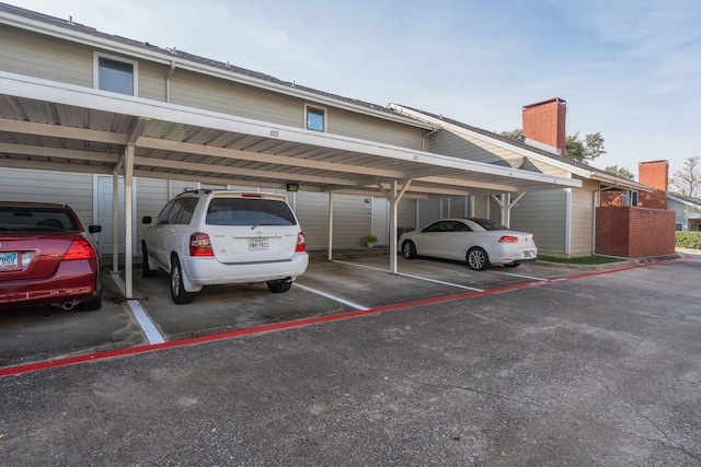 view of car parking featuring a carport