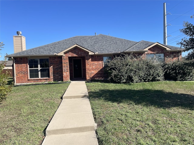 ranch-style home with a front lawn