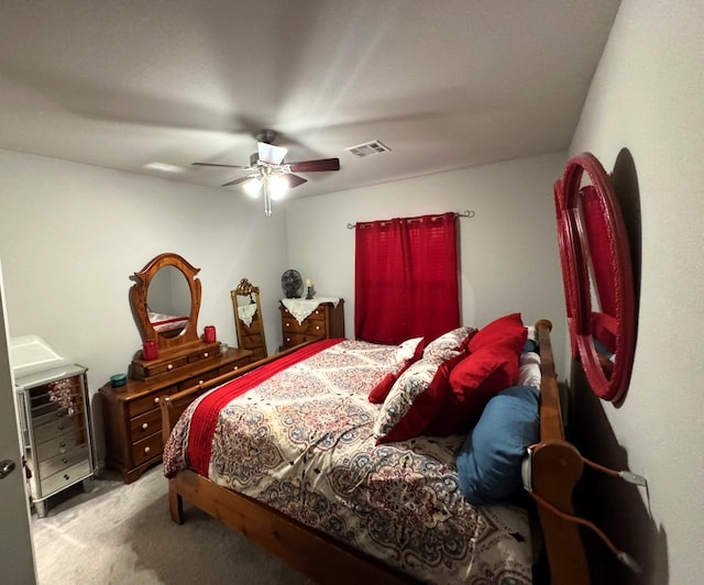 bedroom featuring ceiling fan and light colored carpet