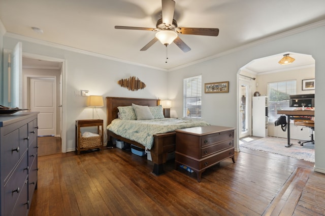 bedroom with arched walkways, ornamental molding, wood-type flooring, and a ceiling fan