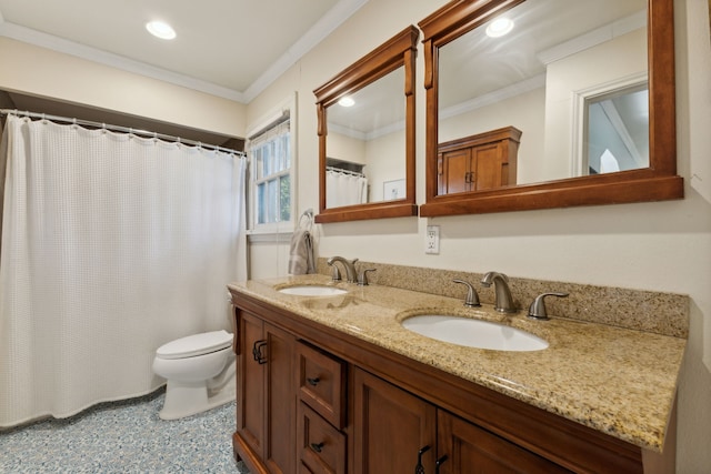 bathroom with toilet, crown molding, and vanity