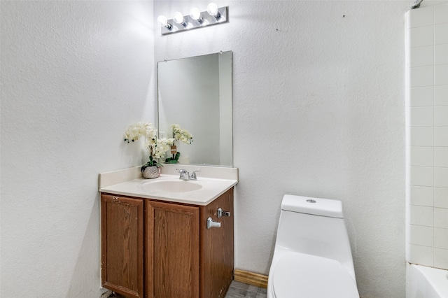 full bathroom featuring vanity, shower / bath combination, and toilet